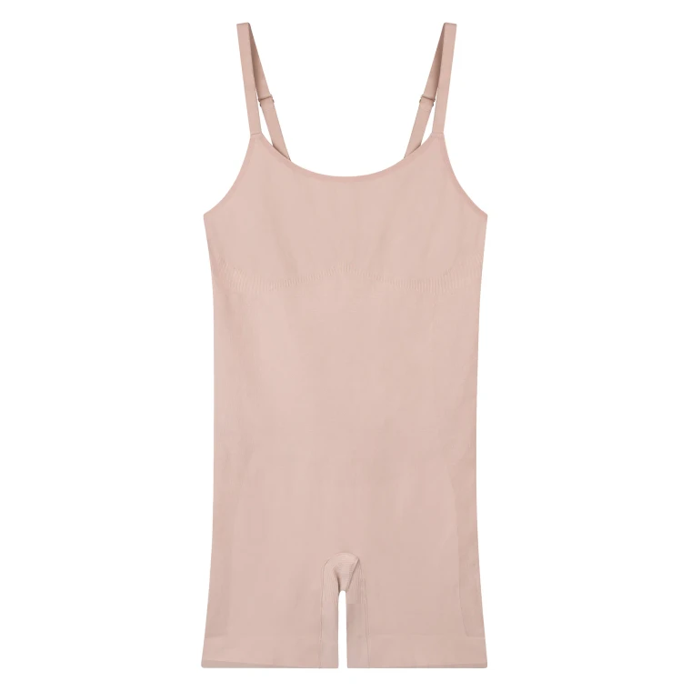 A blush shaping camisole cut out on white, the straps squared and the hem left clean.