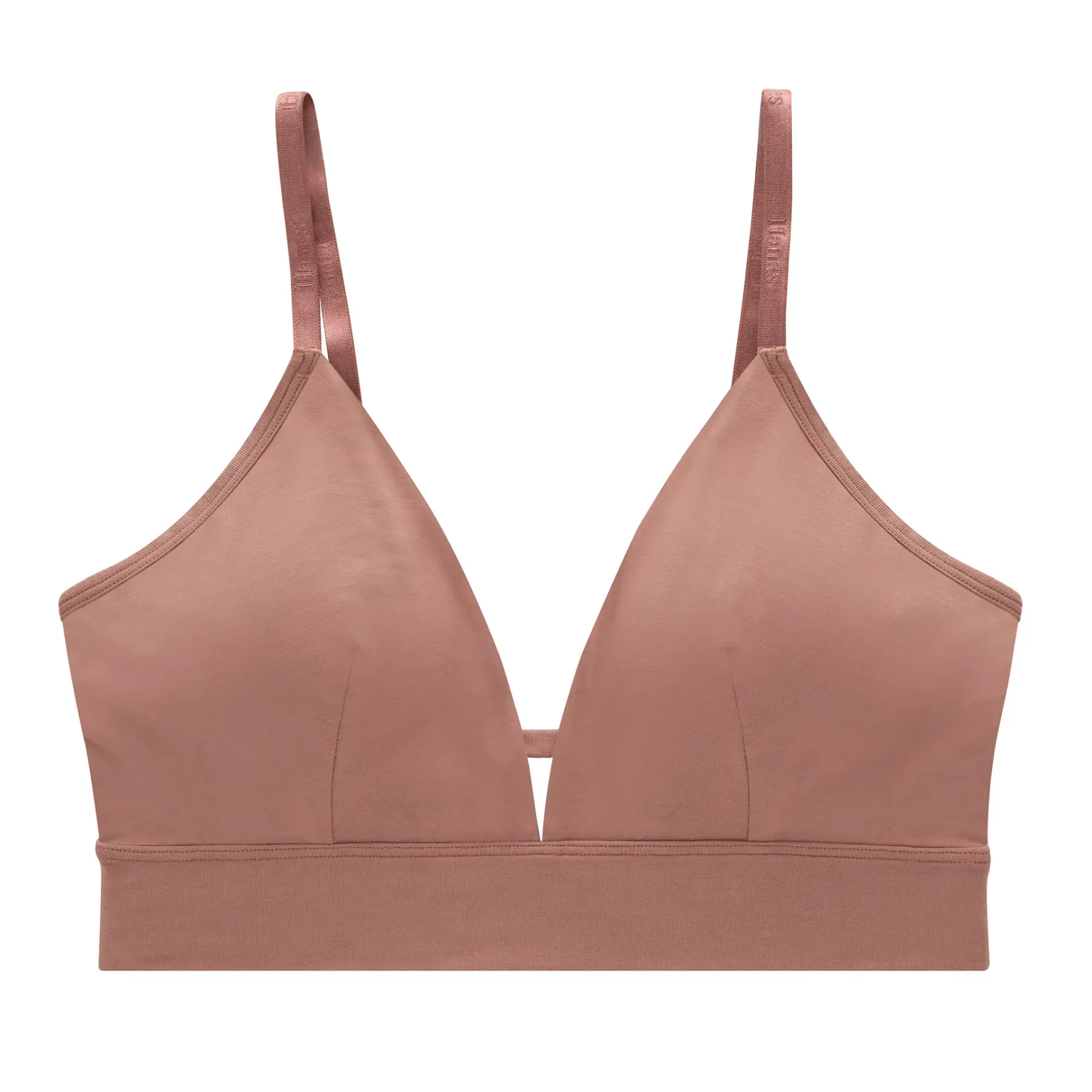 A dusty-rose bralette photographed flat on white, cleaned and cut out, with the straps and seams left crisp.