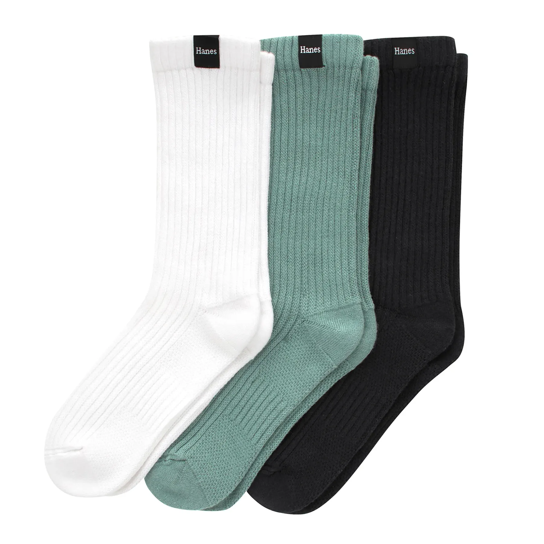 The same three socks laid flat and overlapping on white, ordered white, sage green and black, the ribbing running the length of each.